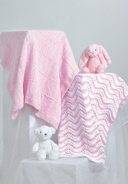 picture shows pink blanket with a squares finsih and a pink and white blanket with a wavy striped design.