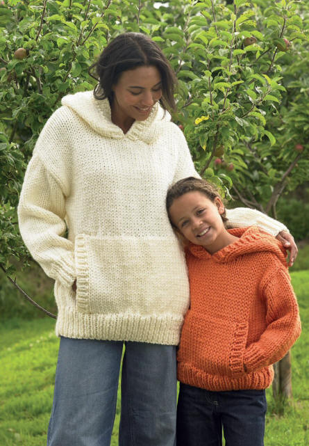 Knitted Ladies and Girls Sweaters with Big Front Pocket - Colours shown are SP02 (Cream) and SP24 (Pumpkin)